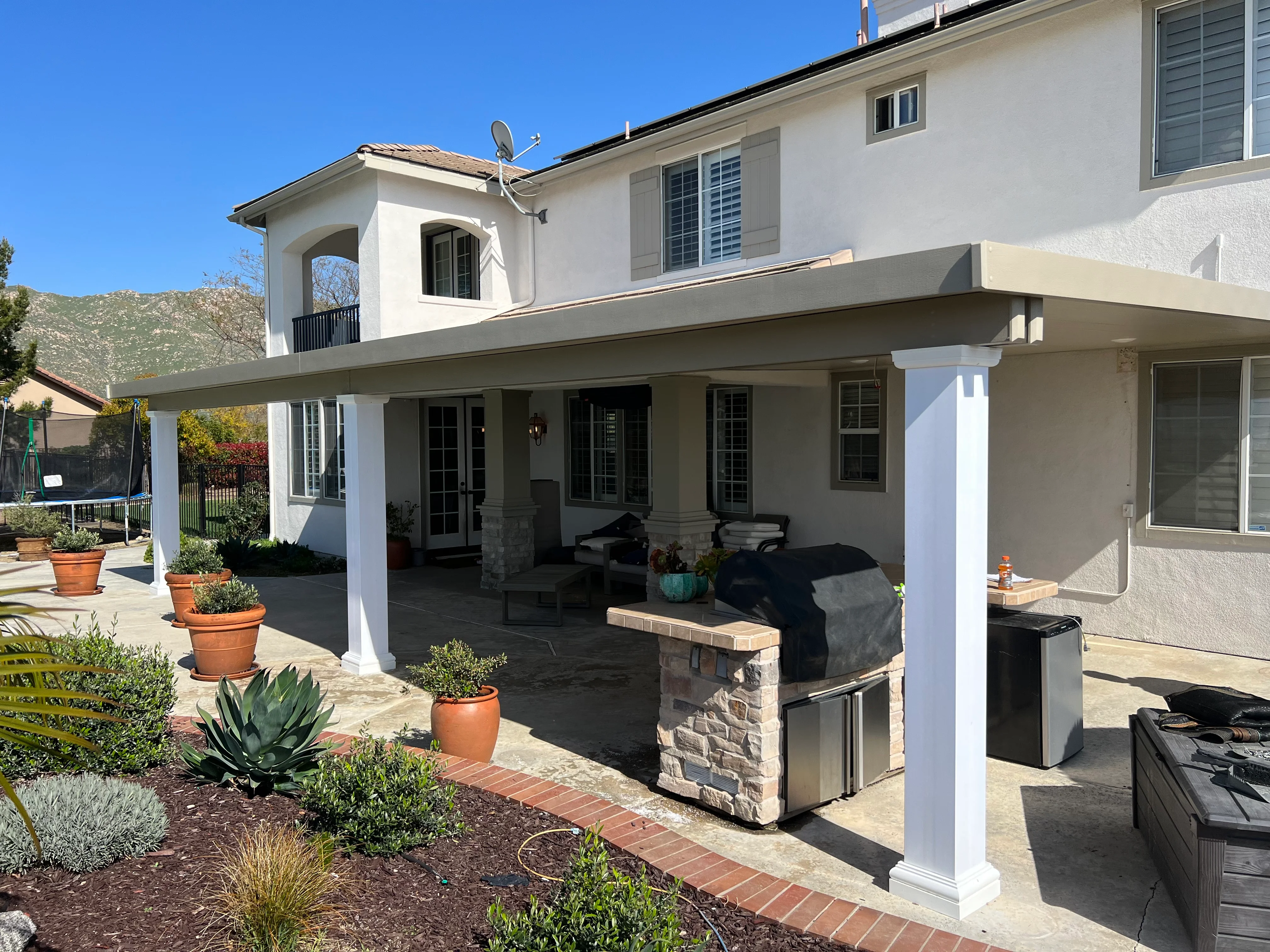 Modern Patio Cover with Integrated Outdoor Kitchen
